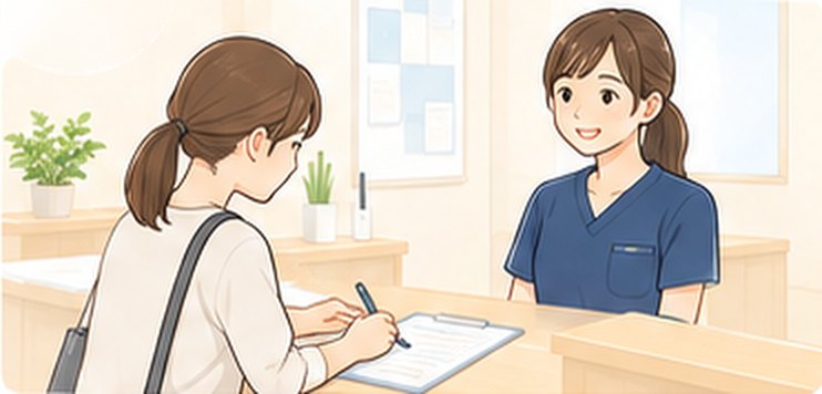 受付で問診票を記入している様子